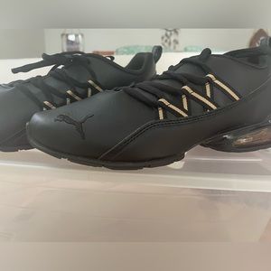 Puma Black and gold soft foam